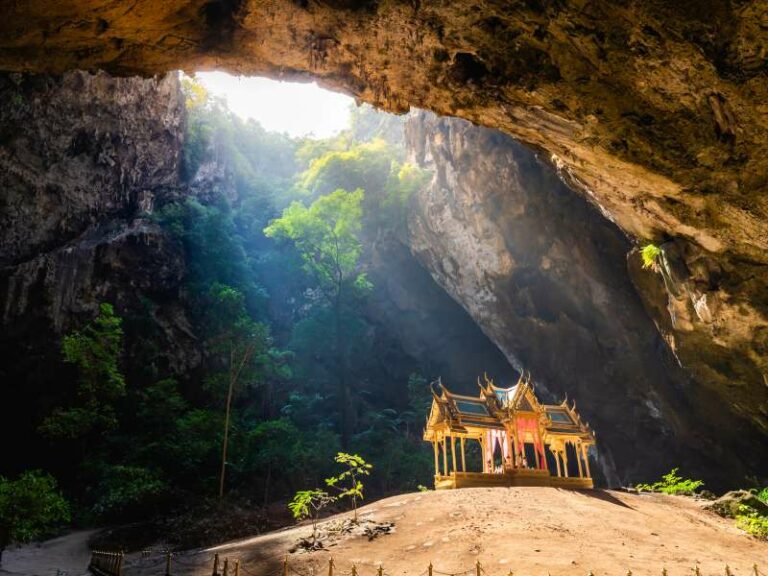 Amazing Phraya Nakhon cave in Khao Sam Roi Yot national park at Prachuap Khiri Khan Thailand is small temple in the sun rays in cave.