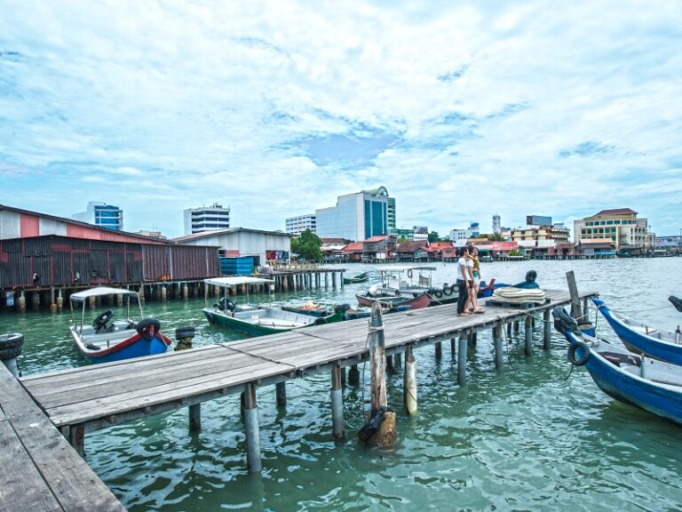 The Clan Jetties are one of the last bastions of old Chinese settlements with enclaves of wooden stilt houses perched over the sea. With the construction of the quay in 1882, the waterfront was developed and settlements grew around these foundations. Gradually each jetty is identified with certain clans. The Chew Jetty is the largest and most well-known, with the most number of stilt houses and longest walkway as well as a temple.