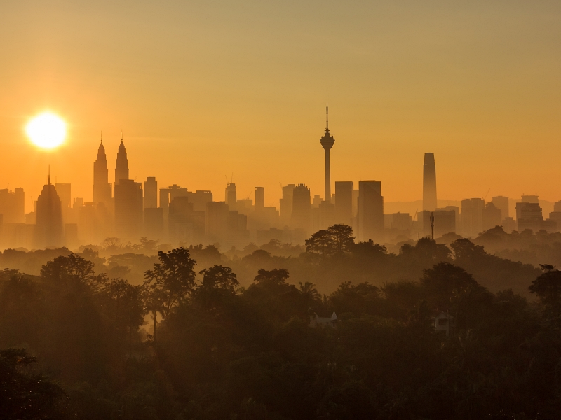 majestic sunrise over kuala lumpur, malaysia city skyline