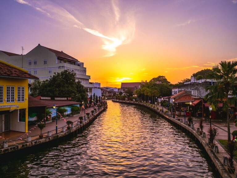 Canal and the old town in melaka, or malacca, Malaysia at dusk