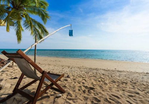 800 - Koh Lanta - beach-chairs-on-beautiful-tropical-island-beach-with-afternoon-light