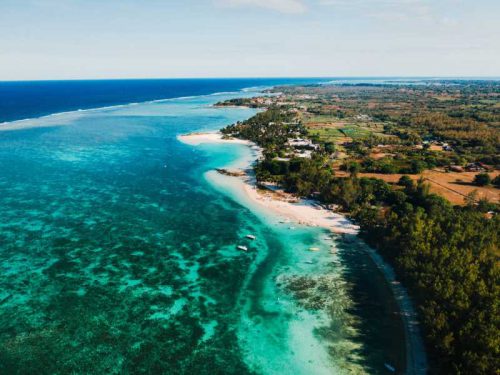 800- Mauritius - aerial-photography-of-the-east-coast-of-the-island-of-mauritius-flying-over-the-turquoise-lagoon-of-mauritius-in-the-belle-mare-area-coral-reef-of-mauritius-mauritius-island-beach