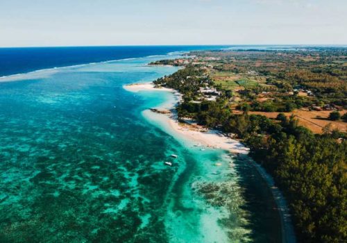 800- Mauritius - aerial-photography-of-the-east-coast-of-the-island-of-mauritius-flying-over-the-turquoise-lagoon-of-mauritius-in-the-belle-mare-area-coral-reef-of-mauritius-mauritius-island-beach