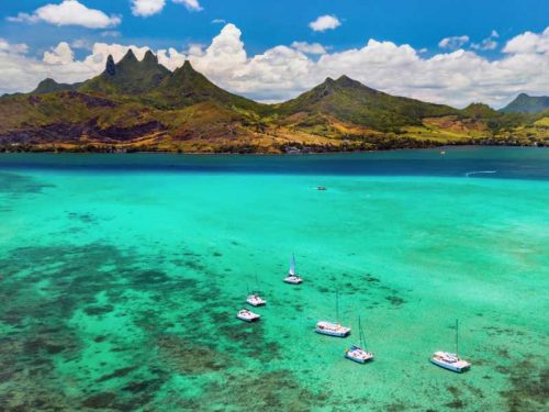 800 - Mauritius - aerial-picture-of-the-east-coast-of-mauritius-island-beautiful-lagoon-of-mauritius-island-shot-from-above-boat-sailing-in-turquoise-lagoon