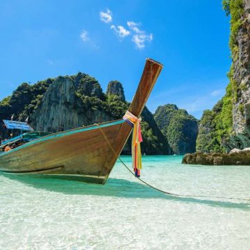 View of thai traditional longtail Boat over clear sea and sky in the sunny day, Phi phi Islands, Thailand