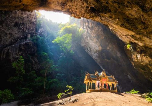Amazing Phraya Nakhon cave in Khao Sam Roi Yot national park at Prachuap Khiri Khan Thailand is small temple in the sun rays in cave.
